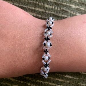 But one and get one free ! Elegant Black and White Pearl Bracelet